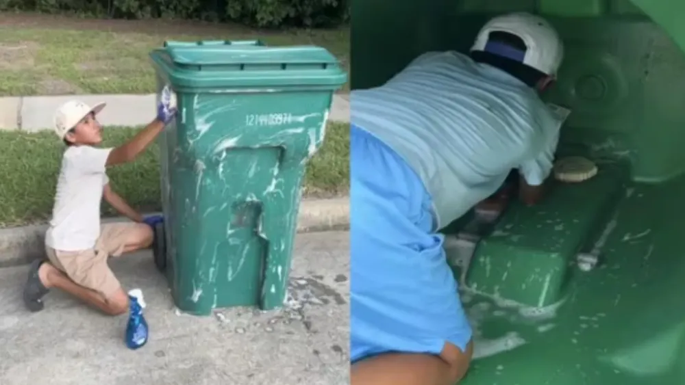 Niño limpiando tachos de basura